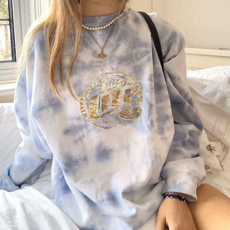 Women's oversized sweatshirt with unique batik pattern and shiny appliqué NOVAE