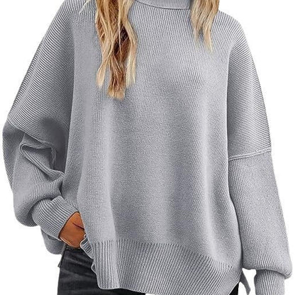 Women's oversized knit sweater with wide sleeves and textured surface NOVAE