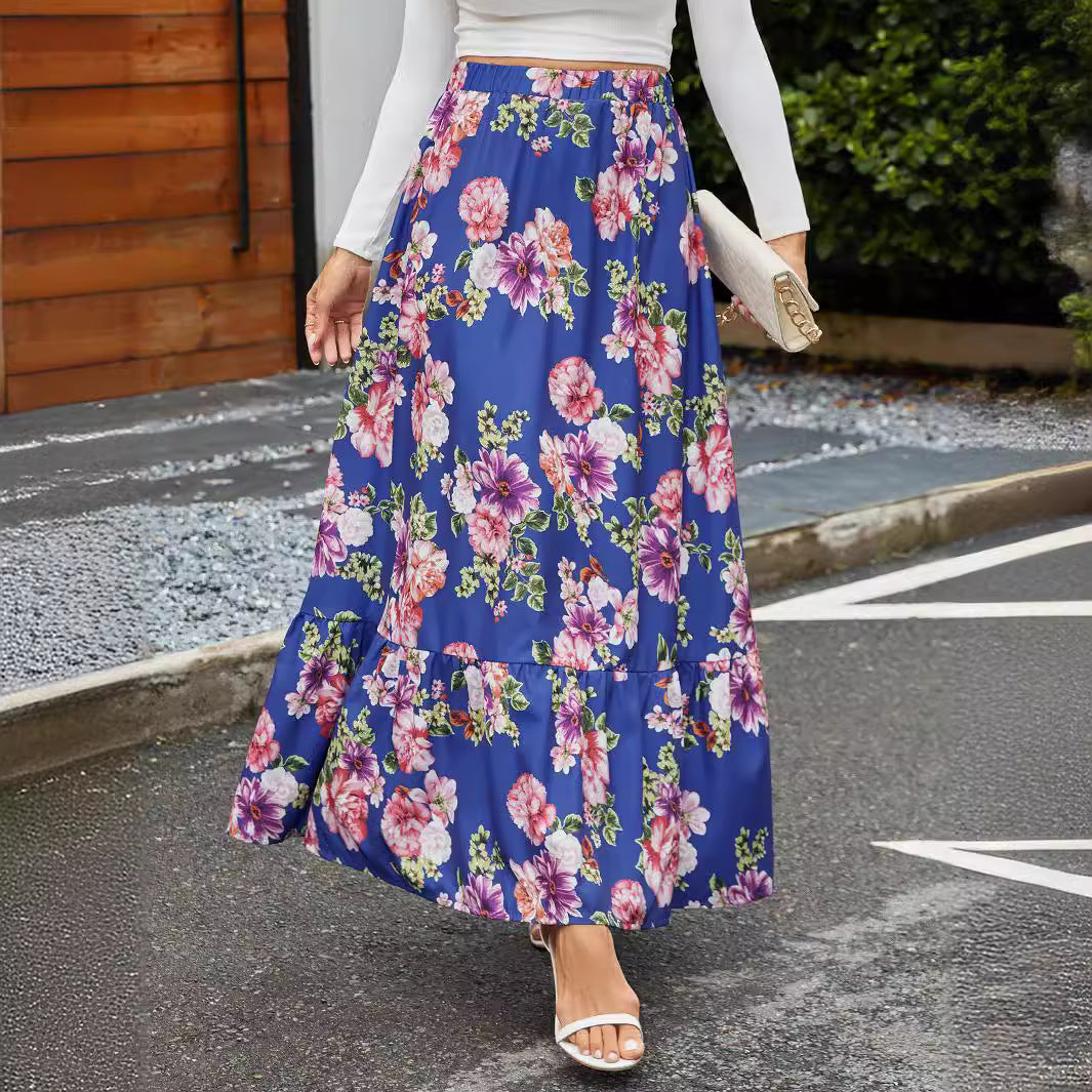 Women's maxi skirt with cheerful floral pattern and voluminous tiered hem NOVAE