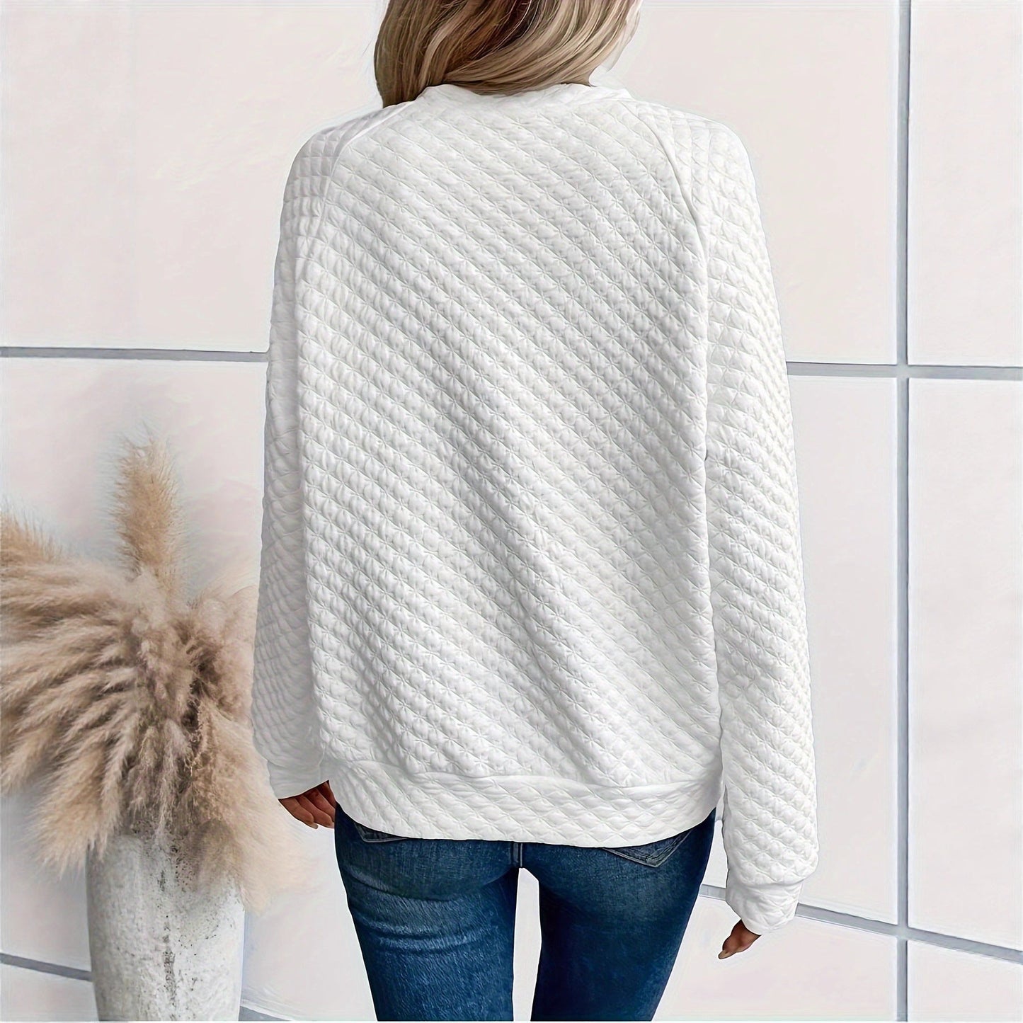 Women's knitted sweater with a textured pattern and fashionable V-neck NOVAE