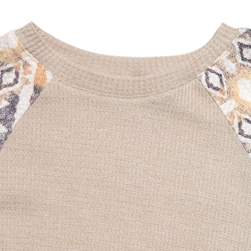 Women's knit sweater with modern raglan sleeves and floral pattern NOVAE