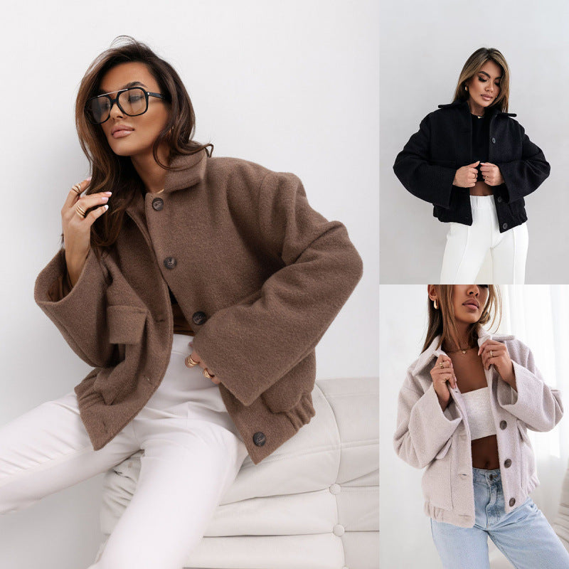 Women's oversized wool jacket with modern button details and practical pockets NOVAE