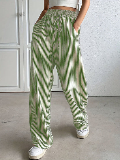 Women's wide-legged striped trousers with elasticated waistband and practical pockets NOVAE