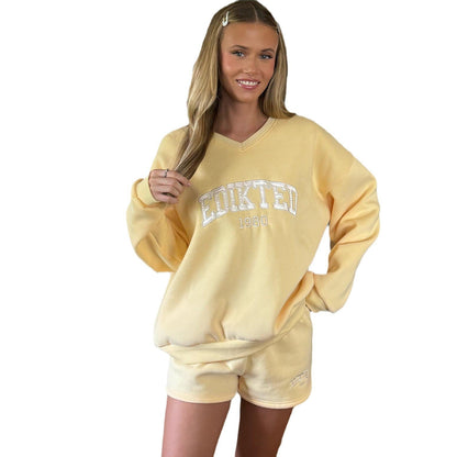 Women's casual sweatshirt with V-neck and modern NOVAE lettering