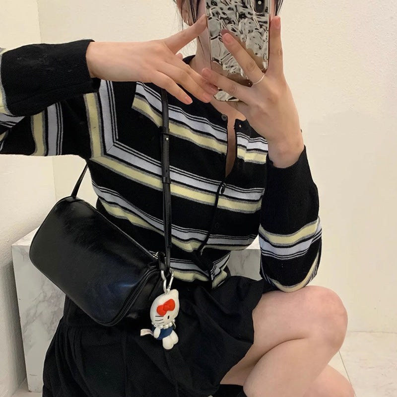 Women's sporty cardigan with fashionable striped pattern and playful buttons NOVAE