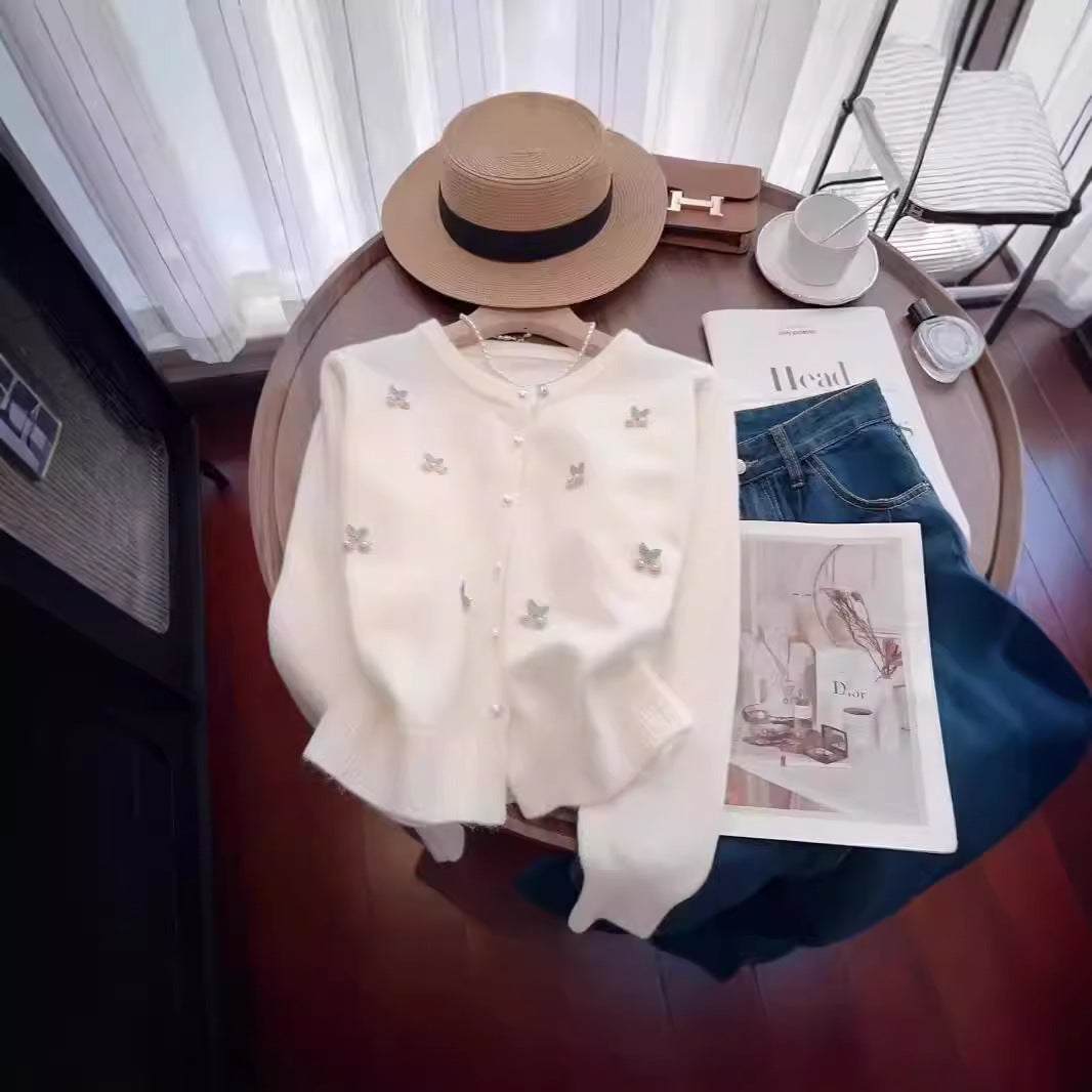 Women's cardigan with floral embroidery and pearl buttons NOVAE