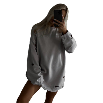 Women's oversized sweatshirt with stylish ripped details and a wide fit NOVAE
