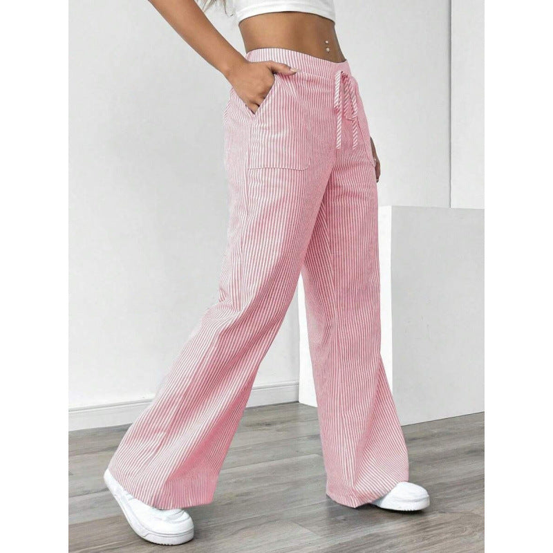 Women's wide-legged striped trousers with a high waist and practical pockets NOVAE