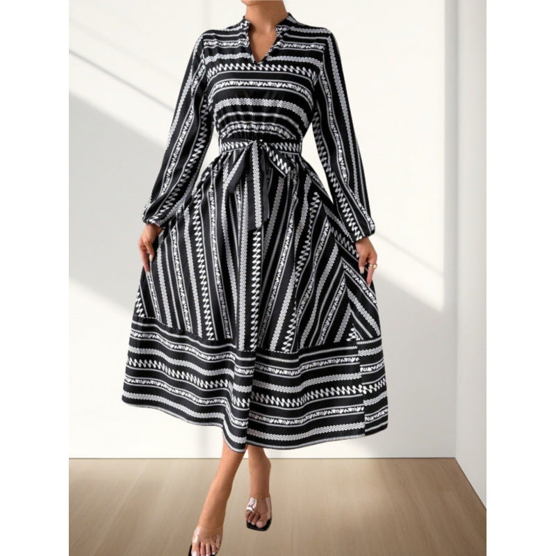 Women's maxi dress with a modern geometric pattern and a beautiful waist belt NOVAE