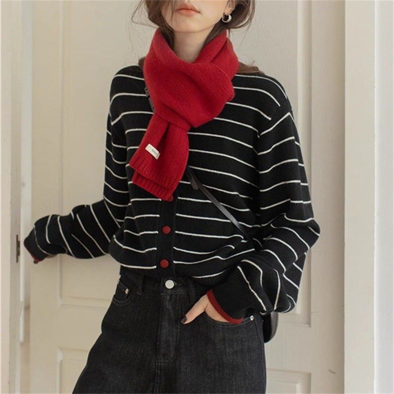 Women's cozy knit cardigan with a youthful striped pattern and practical button closure NOVAE