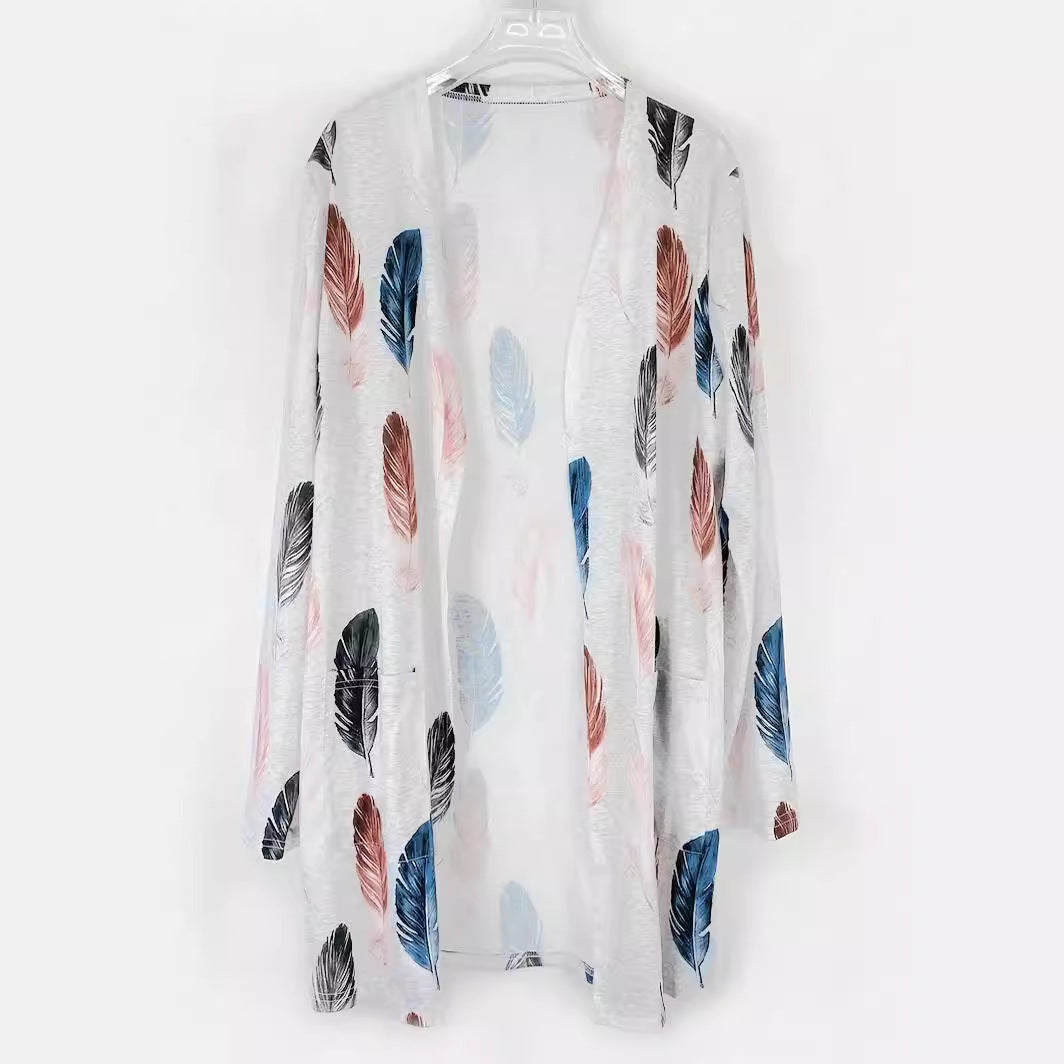 Women's long cardigan with floral pattern and practical pockets NOVAE