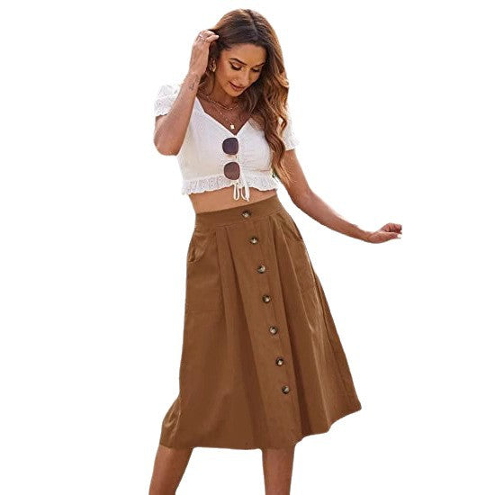 Women's midi skirt with button placket and practical pockets NOVAE