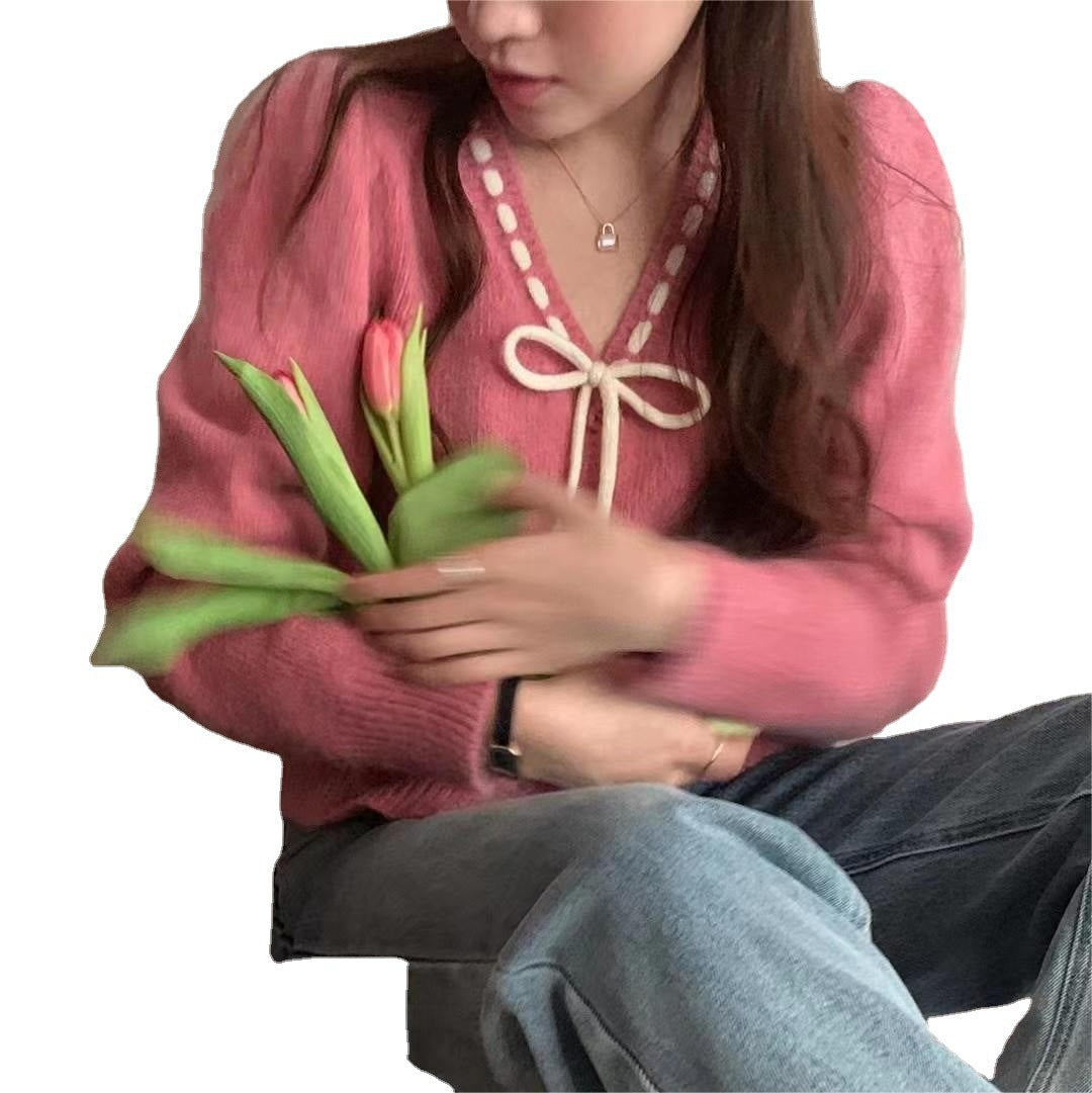 Women's cozy cardigan with contrasting buttons and elegant details NOVAE