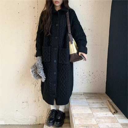 Women's chunky knit button-up coat with elegant cable pattern and practical pockets NOVAE