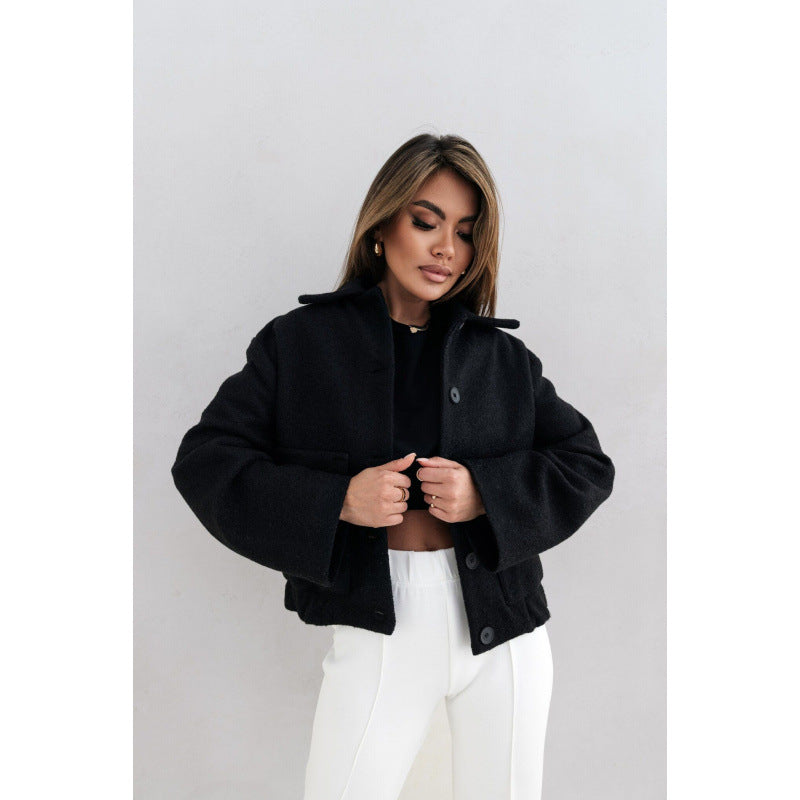 Women's oversized wool jacket with modern button details and practical pockets NOVAE