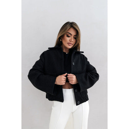 Women's oversized wool jacket with modern button details and practical pockets NOVAE