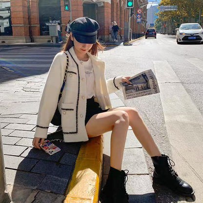 Women's fashionable cardigan with elegant contrast stitching and button details NOVAE