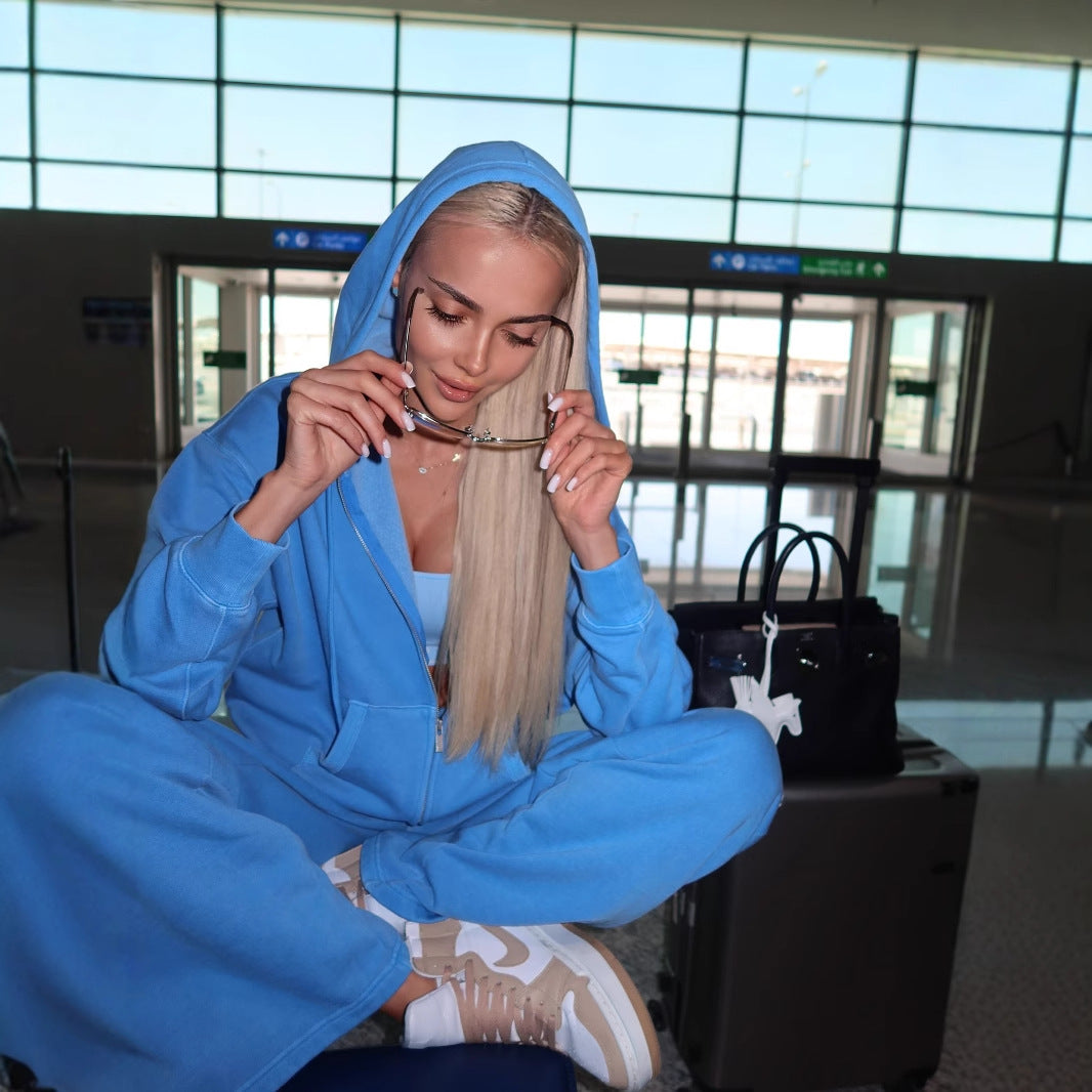 Women's comfortable leisure suit with hood and practical pockets NOVAE