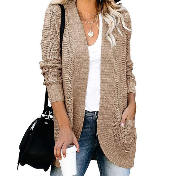 Women's knitted cardigan with practical pockets and airy structure NOVAE