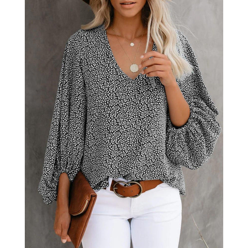 Women's blouse with wide puff sleeves and elegant V-neck NOVAE