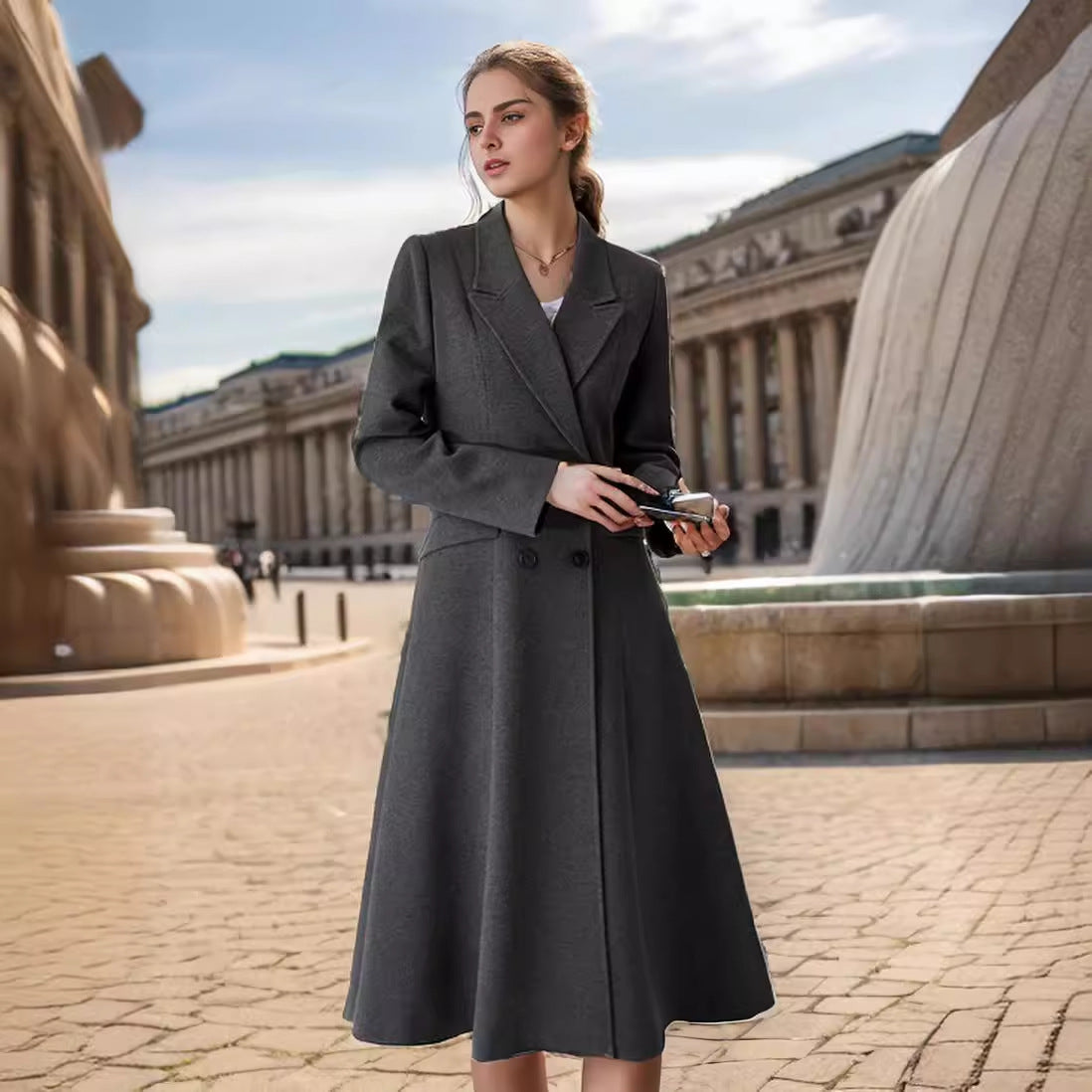 Women's elegant maxi coat with double-breasted button closure and wide, flowing skirt NOVAE