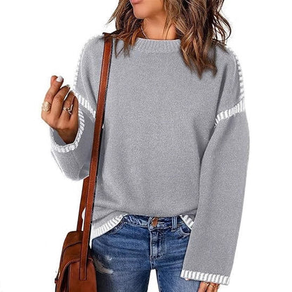 Women's fashionable sweater with textured material and striped details NOVAE