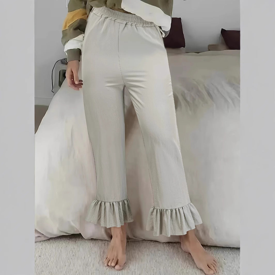 Women's casual trousers with ruffled trim NOVAE