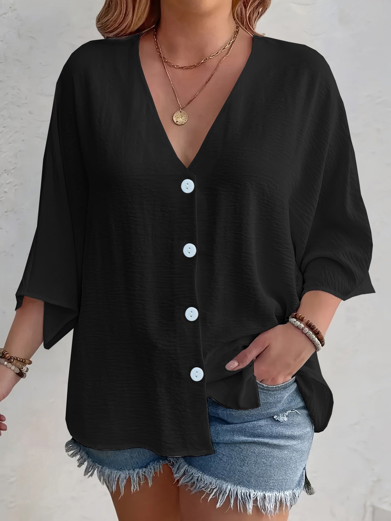 Women's flattering short-sleeved blouse with button placket and V-neck NOVAE