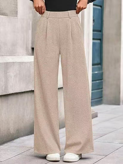 Women's wide-leg trousers with a high waistband and practical side pockets NOVAE