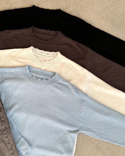 Women's casual sweater with a modern ribbed collar and trendy rip details NOVAE