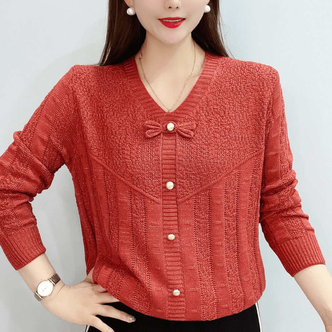 Women's knitted top with decorative pearl buttons and sophisticated bow design NOVAE