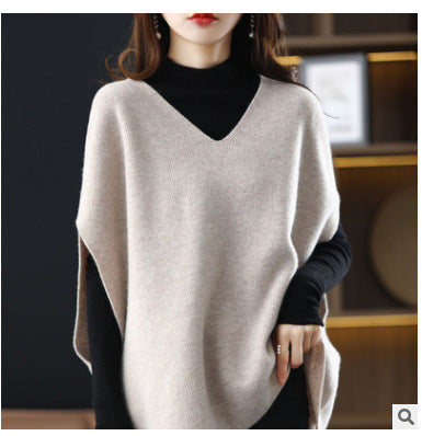Women's knitted poncho with V-neck and elegant silhouette NOVAE