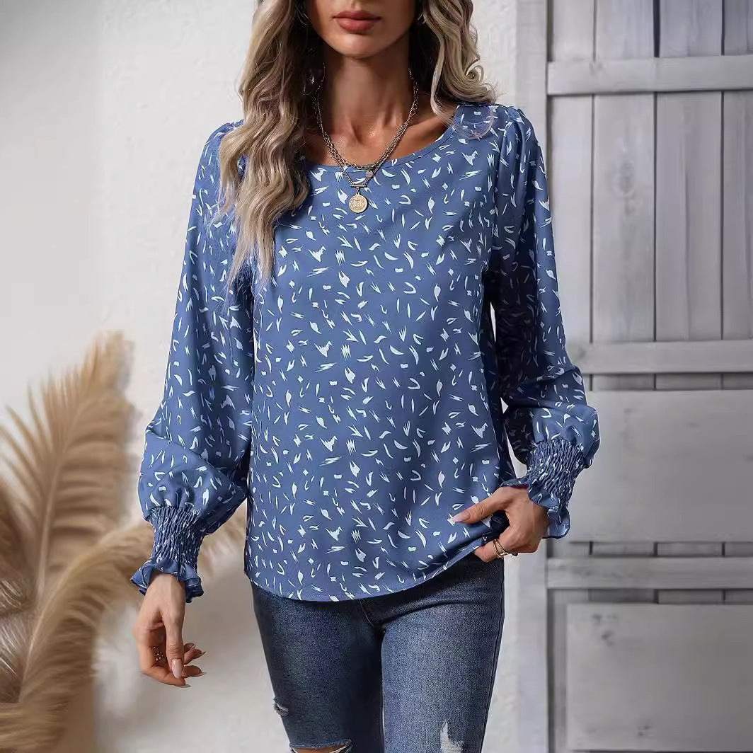 Women's elegant blouse with sophisticated puff sleeves and delicate pattern NOVAE