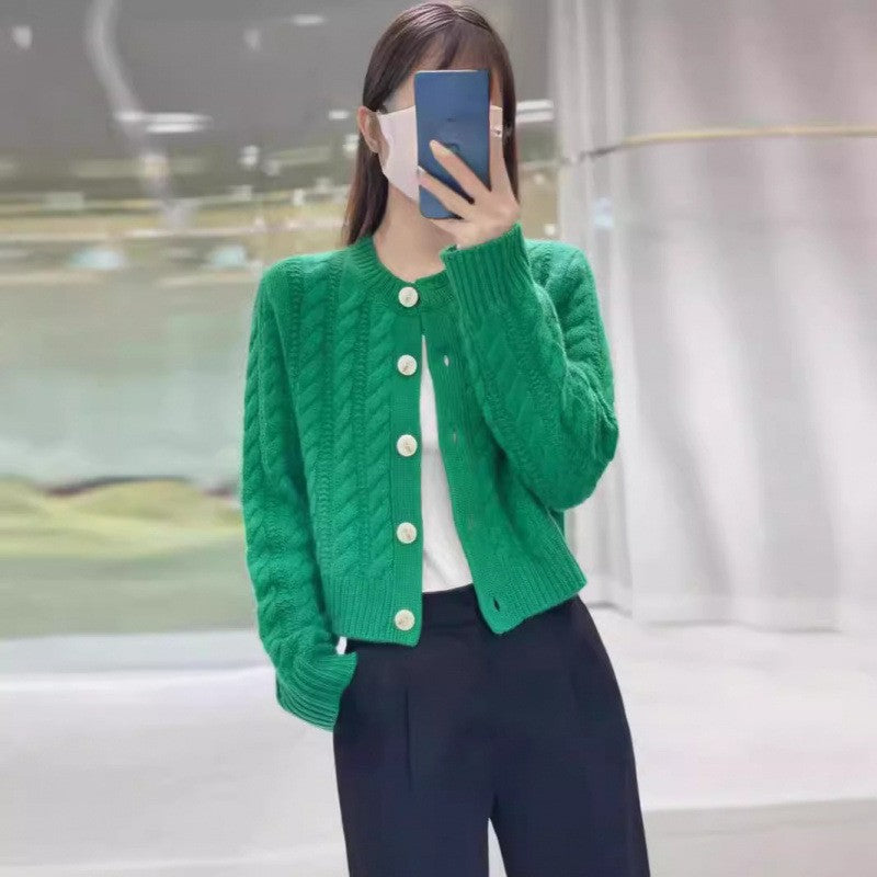 Women's chunky knit cardigan with decorative buttons and special cable pattern NOVAE