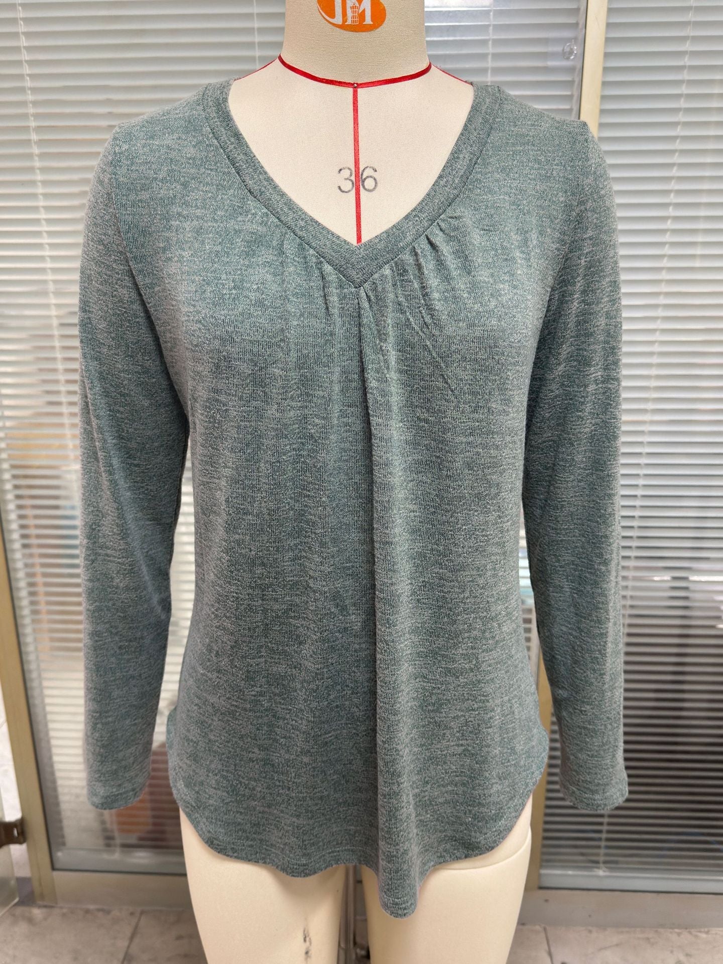 Women's casual long-sleeved shirt with V-neck and pleat detail NOVAE