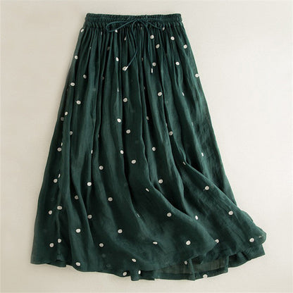 Women's long, airy skirt with elastic waistband and polka dot design NOVAE