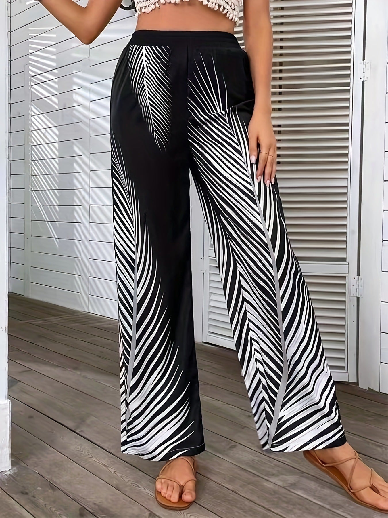 Women's Elegant and airy palazzo trousers with palm print NOVAE