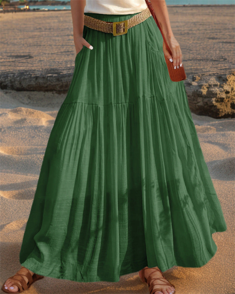Women's wide-flared maxi skirt with elegant pleats and practical pockets NOVAE