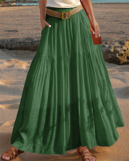 Women's wide-flared maxi skirt with elegant pleats and practical pockets NOVAE