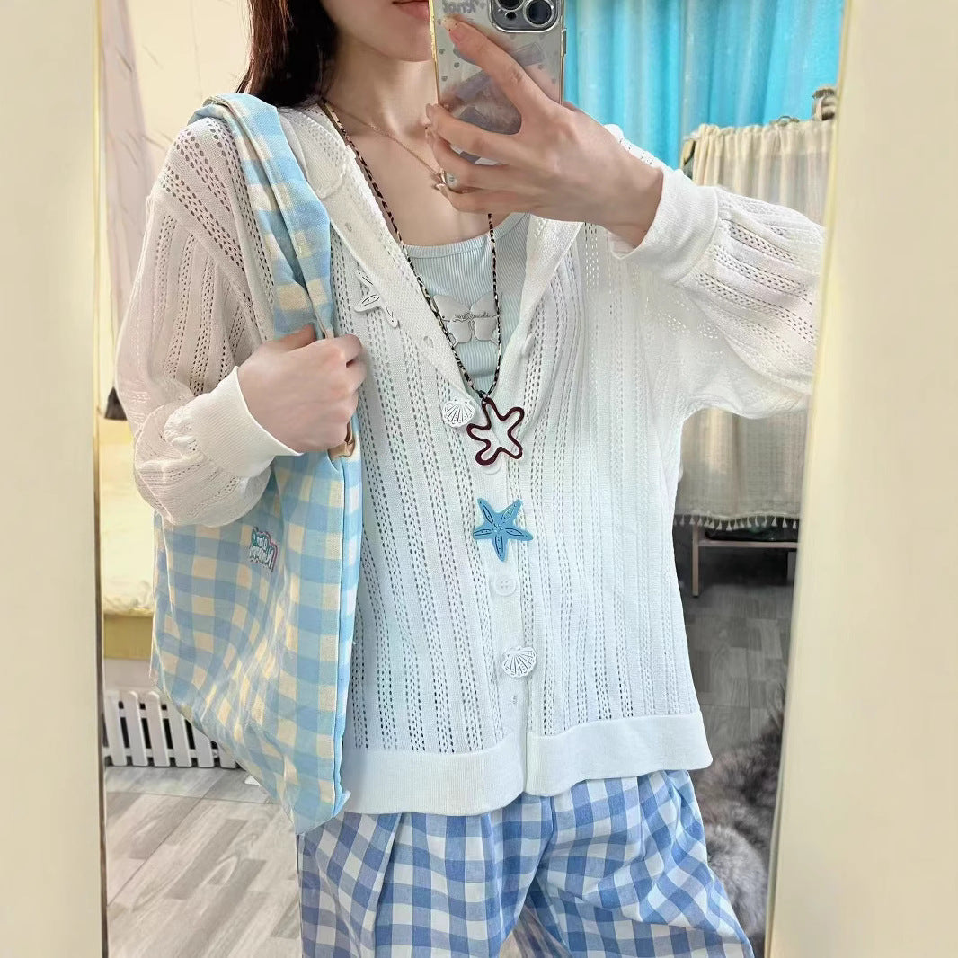 Women's cardigan with airy openwork pattern and practical pockets NOVAE