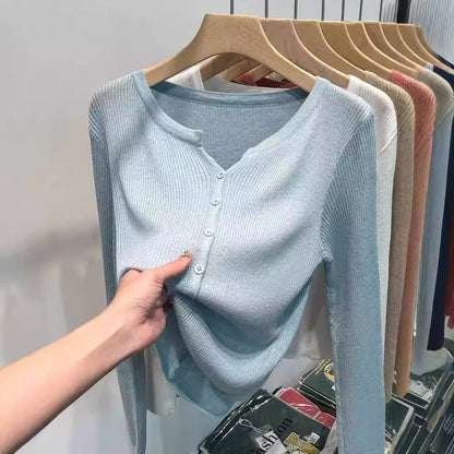 Women's figure-hugging cardigan with elegant button closure and fine ribbed texture NOVAE