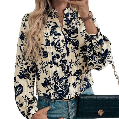 Women's blouse with floral motifs and elegant ruching NOVAE