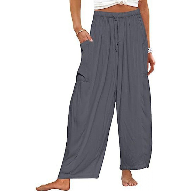 Women's wide and comfortable summer trousers with elasticated waistband and practical pockets NOVAE