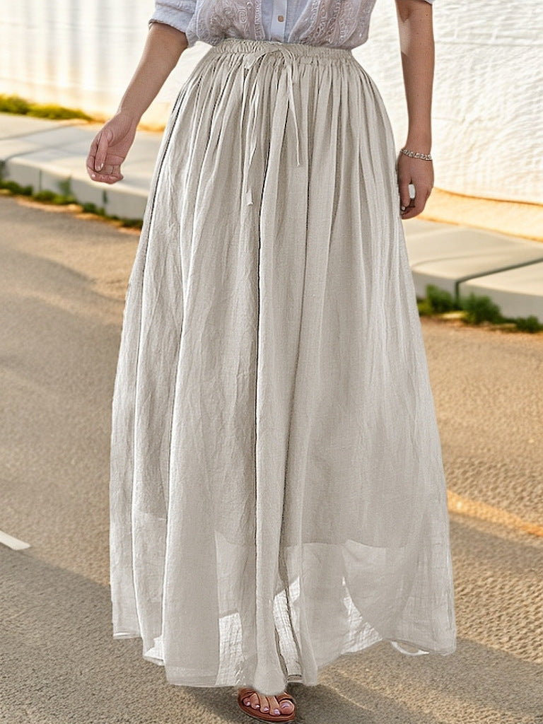 Women's elegant maxi skirt with a flowing cut and practical tie straps NOVAE