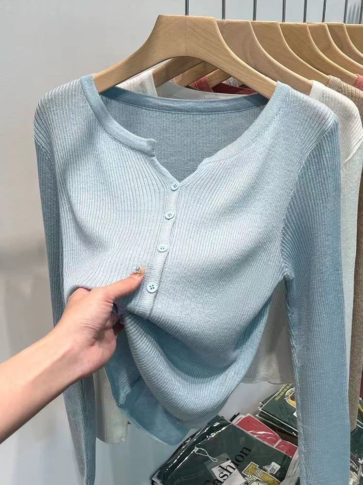 Women's figure-hugging cardigan with elegant button closure and fine ribbed texture NOVAE