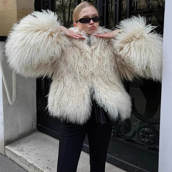 Women's fluffy faux fur jacket in a long cut with wide flared sleeves NOVAE