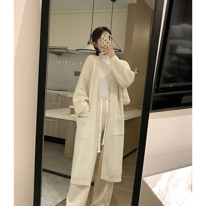 Women's long knit cardigan with practical pockets and elegant silhouette NOVAE