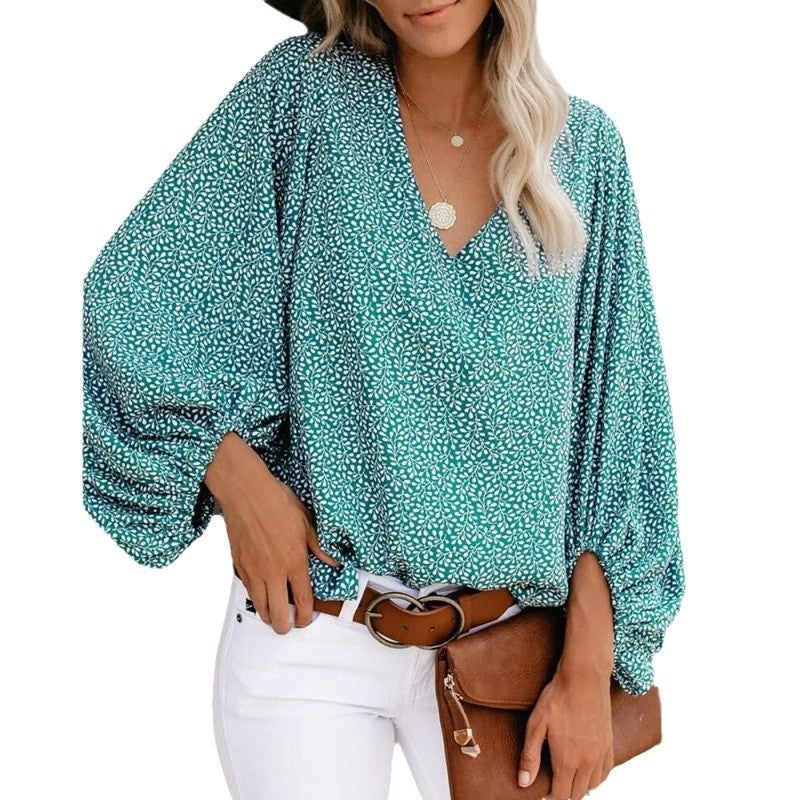 Women's blouse with wide puff sleeves and elegant V-neck NOVAE