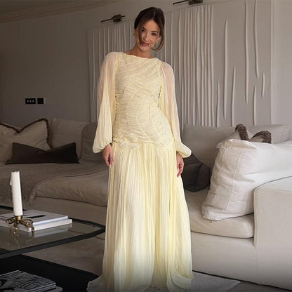 Women's maxi dress with sophisticated pleats and elegant long sleeves NOVAE