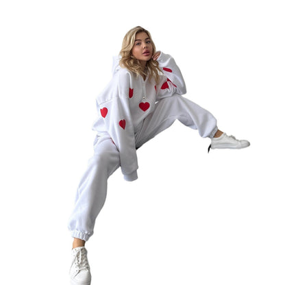 Women's cozy hooded top with heart motif and relaxed fit NOVAE